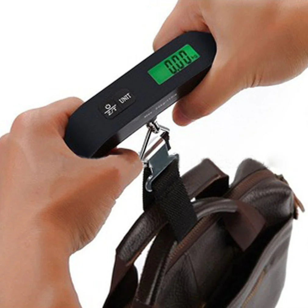 T-shaped Electronic Luggage Scale displaying weight on the digital screen. Compact and lightweight T-shaped Luggage Scale, perfect for travel.